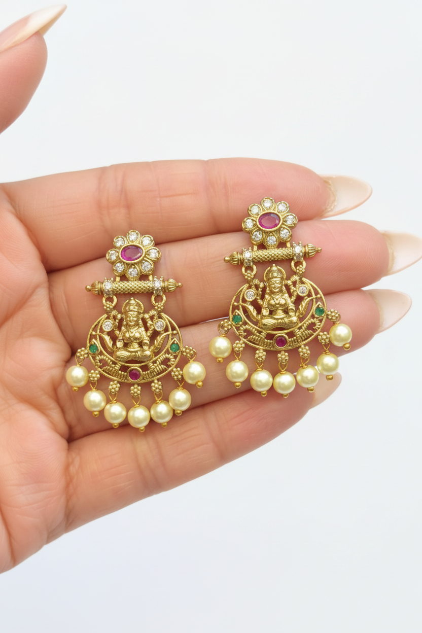 Hand Holding Jhumkas